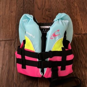 Brand New, Never Used Infant life jacket. Bought as a back up on vacation!